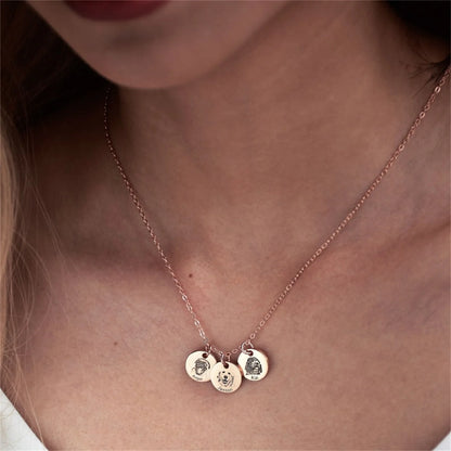 woman wearing custom gold pet charm necklace